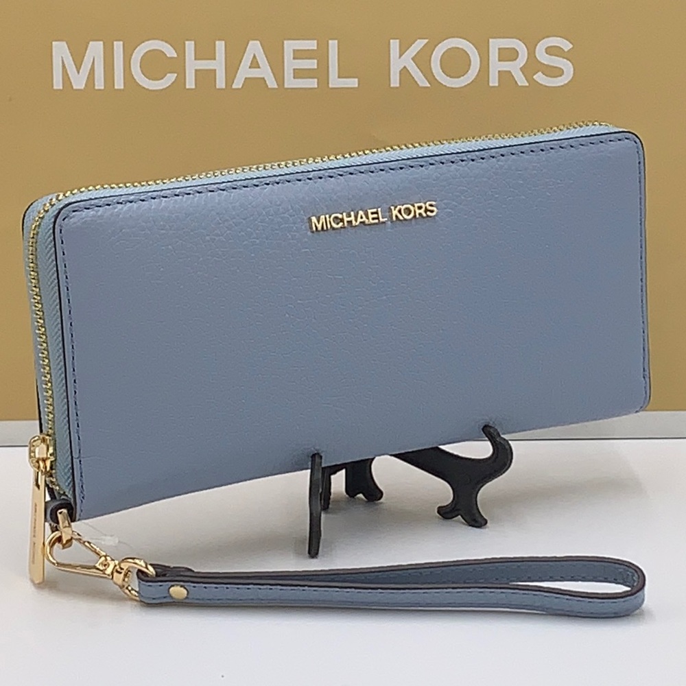 MICHAEL KORS LARGE TRAVEL CONTINENTAL WRISTLET WALLET PALE BLUE COLOR